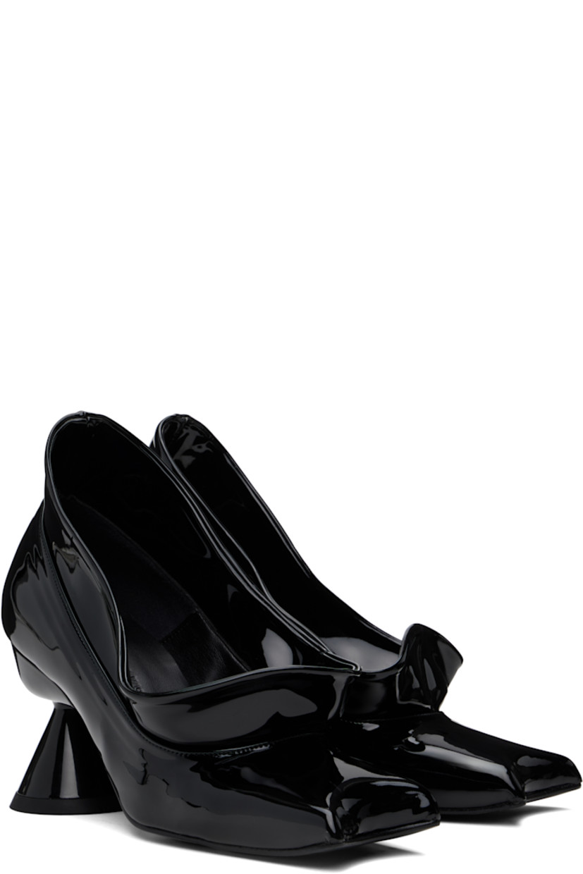 Patent faux-leather heels in black.

· Modified square toe
· Extended collar
· Logo embossed at padded footbed
· Covered spool heel with rubber injection
· Faux-leather sole with rubber injection
· Heel: H3"

Supplier color: Black