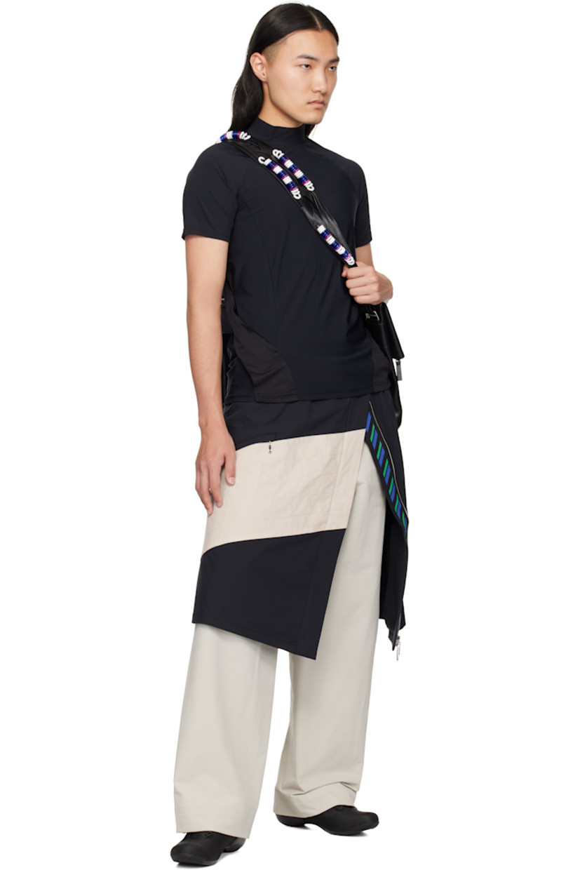 Nylon-blend jersey T-shirt.

· Mock neck 
· Mesh straps at sides with concealed zip pockets

Supplier color: Black