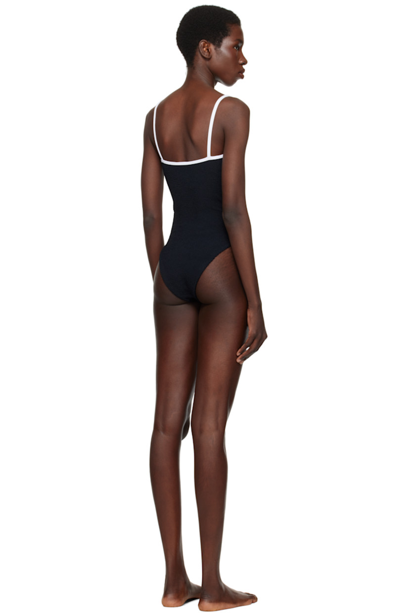 Shirred stretch nylon jersey one-piece swimsuit.

· Scoop neck
· Fixed spaghetti straps
· Low back
· Unlined

This product uses Original Crinkle™ Technology. Fits US size 2-12.

Supplier color: Black/White
