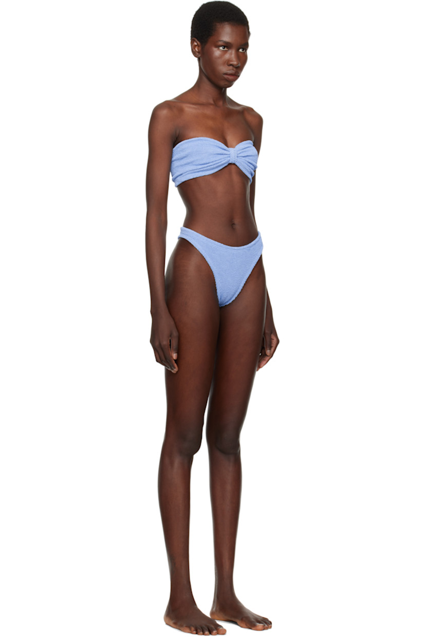 Shirred stretch nylon jersey bandeau-style bikini top.

· Sweetheart neck
· Knotted accent and gathering at chest
· Unlined

Shirred stretch nylon jersey bikini bottom.

· Elasticized waistband
· Ruching at back
· Unlined

This product uses Original Crinkle™ Technology. Fits US size 2-12.

Supplier color: Cornflower