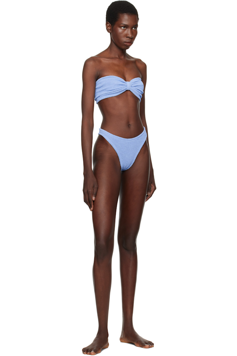 Shirred stretch nylon jersey bandeau-style bikini top.

· Sweetheart neck
· Knotted accent and gathering at chest
· Unlined

Shirred stretch nylon jersey bikini bottom.

· Elasticized waistband
· Ruching at back
· Unlined

This product uses Original Crinkle™ Technology. Fits US size 2-12.

Supplier color: Cornflower