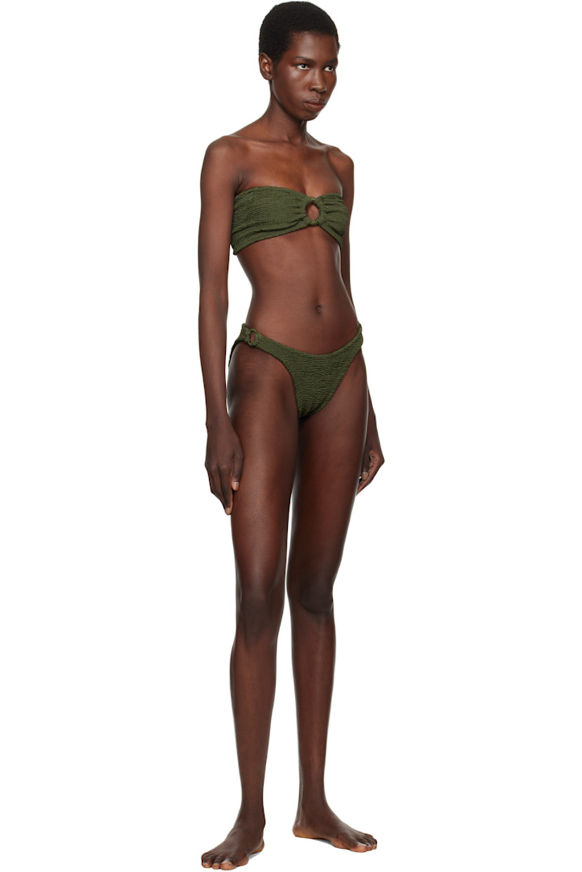 Shirred stretch nylon jersey bandeau-style bikini top.

· Sweetheart neck
· O-ring and gathering at chest
· Unlined

Shirred stretch nylon jersey bikini bottom.

· Elasticized waistband
· O-ring at sides
· Unlined

This product uses Original Crinkle™ Technology. Fits US sizes 2-12.

Supplier color: Metallic khaki