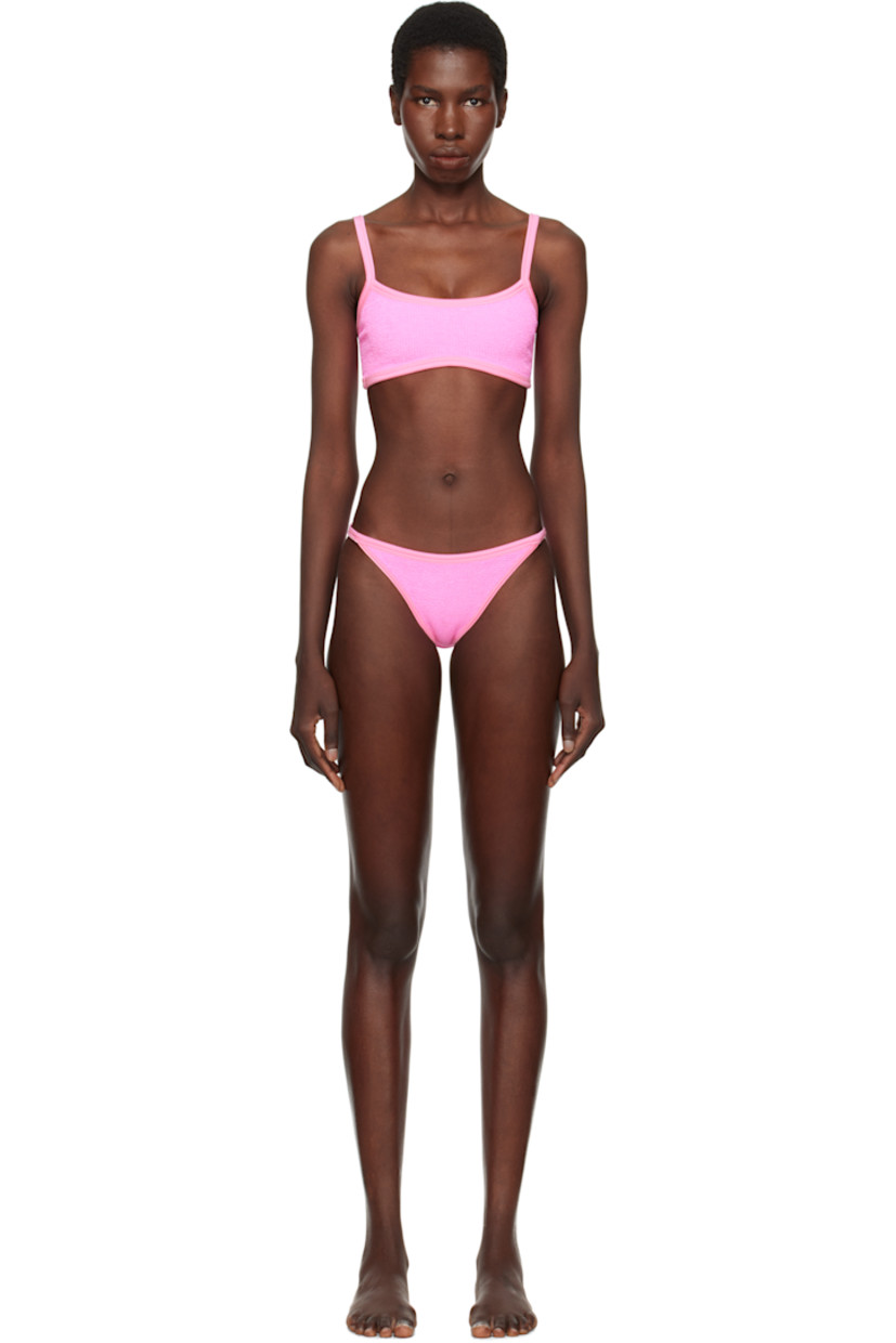 Shirred stretch nylon jersey bikini top.

· Square neck
· Fixed spaghetti straps
· Unlined

Shirred stretch nylon jersey bikini bottom.

· Elasticized waistband
· Unlined

This product uses Original Crinkle™ Technology. Fits US sizes 2-12.

Supplier color: Bubblegum