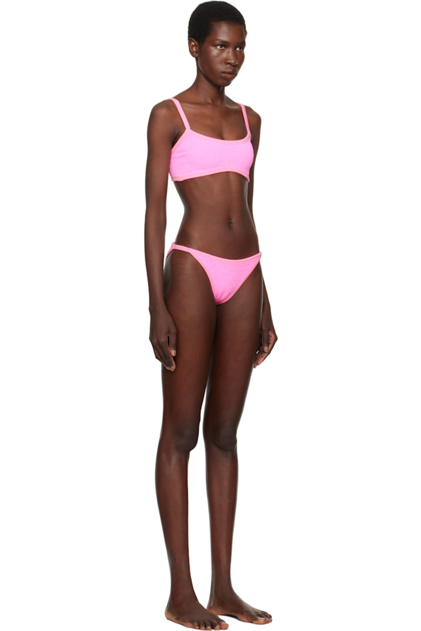Shirred stretch nylon jersey bikini top.

· Square neck
· Fixed spaghetti straps
· Unlined

Shirred stretch nylon jersey bikini bottom.

· Elasticized waistband
· Unlined

This product uses Original Crinkle™ Technology. Fits US sizes 2-12.

Supplier color: Bubblegum