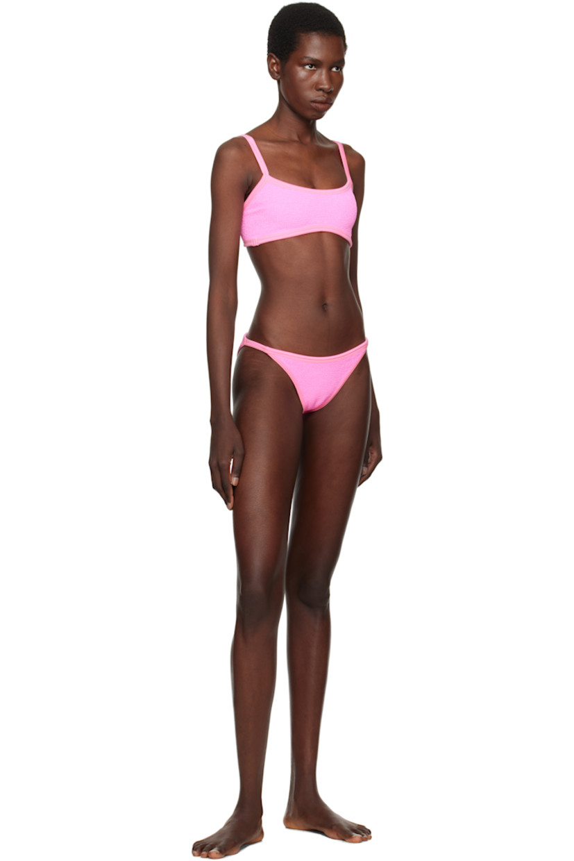 Shirred stretch nylon jersey bikini top.

· Square neck
· Fixed spaghetti straps
· Unlined

Shirred stretch nylon jersey bikini bottom.

· Elasticized waistband
· Unlined

This product uses Original Crinkle™ Technology. Fits US sizes 2-12.

Supplier color: Bubblegum