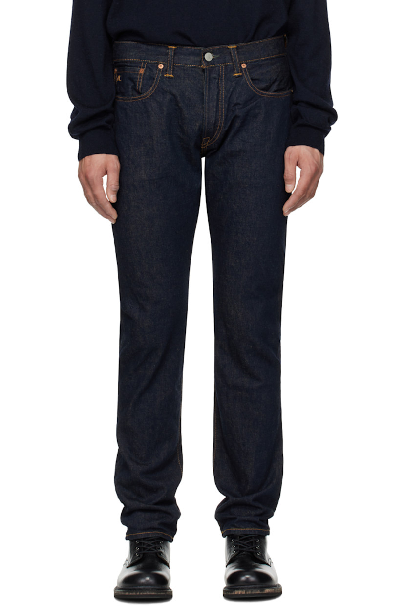 Non-stretch right-hand twill selvedge denim jeans. 

· Sanforized® and rope-dyed 13.75 oz denim
· Slim-fit
· Belt loops
· Five-pocket styling 
· Button fly
· Logo embroidered at coin pocket
· Suede logo patch at back waistband
· Logo-engraved silver- and copper-tone hardware
· Contrast stitching in tan

Supplier color: Once washed 3