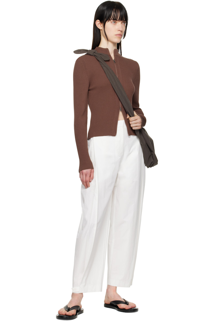 Nylon taffeta shoulder bag in brown. 

· Adjustable self-tie shoulder strap
· Gathering at base 
· Open throat
· Removable base pad at interior 
· Full plain-woven lining 
· H15" x W21" x D4"

Available exclusively at SSENSE. 

Supplier color: Brown