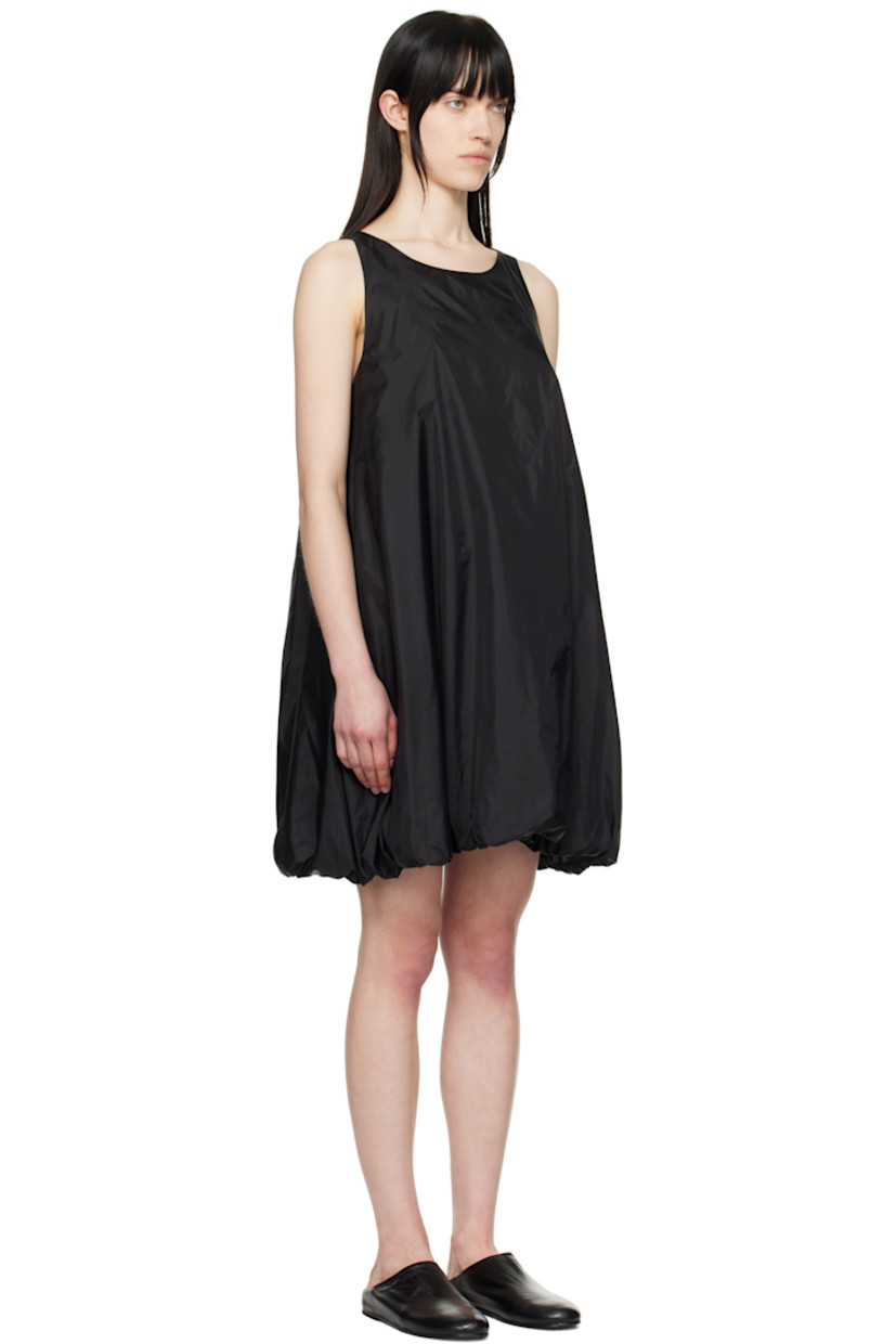 Lightweight nylon taffeta minidress.

· Round neck
· Seam pockets
· Bubble hem
· Zip closure at back
· Full mesh lining

Supplier color: Black