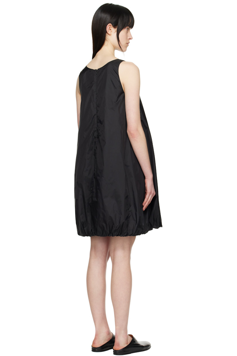 Lightweight nylon taffeta minidress.

· Round neck
· Seam pockets
· Bubble hem
· Zip closure at back
· Full mesh lining

Supplier color: Black