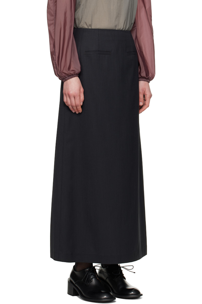 Textured plain-woven wool-blend maxi skirt. 

· Darts at front and back waistband
· Welt pockets
· Zip closure at back 
· Central vent at back hem
· Partial sateen lining

Supplier color: Black