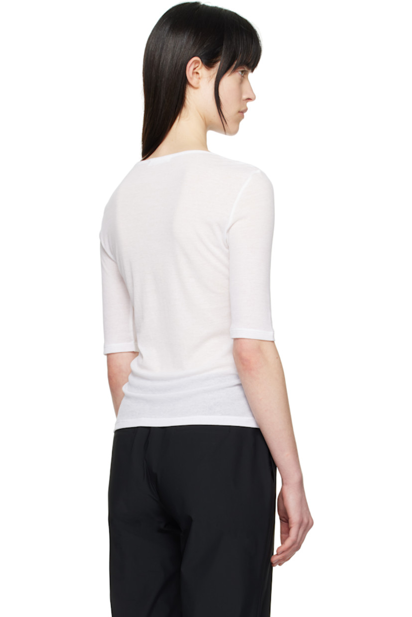 Semi-sheer cotton jersey T-shirt.
 
· Slim-fit
· Crewneck
· Three-quarter sleeves

Supplier color: White