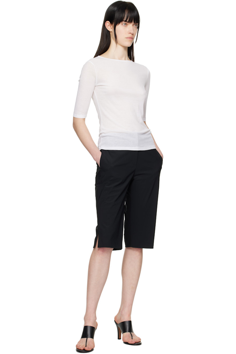 Semi-sheer cotton jersey T-shirt.
 
· Slim-fit
· Crewneck
· Three-quarter sleeves

Supplier color: White