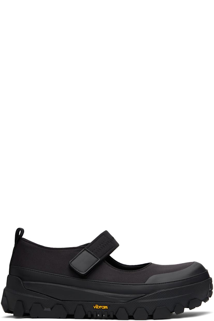 Jersey and buffed faux-leather ballerina flats in black.

· Rubber cap toe
· Velcro closure
· Pull-loop at heel tab
· Padded mesh footbed
· Logo embossed at textured foam rubber midsole
· Treaded Vibram® rubber sole

Supplier color: Black