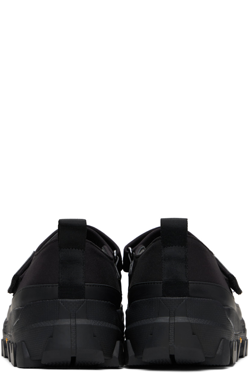 Jersey and buffed faux-leather ballerina flats in black.

· Rubber cap toe
· Velcro closure
· Pull-loop at heel tab
· Padded mesh footbed
· Logo embossed at textured foam rubber midsole
· Treaded Vibram® rubber sole

Supplier color: Black