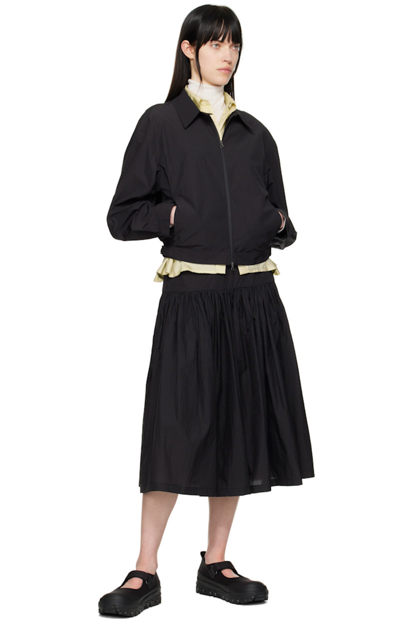 Jersey and buffed faux-leather ballerina flats in black.

· Rubber cap toe
· Velcro closure
· Pull-loop at heel tab
· Padded mesh footbed
· Logo embossed at textured foam rubber midsole
· Treaded Vibram® rubber sole

Supplier color: Black