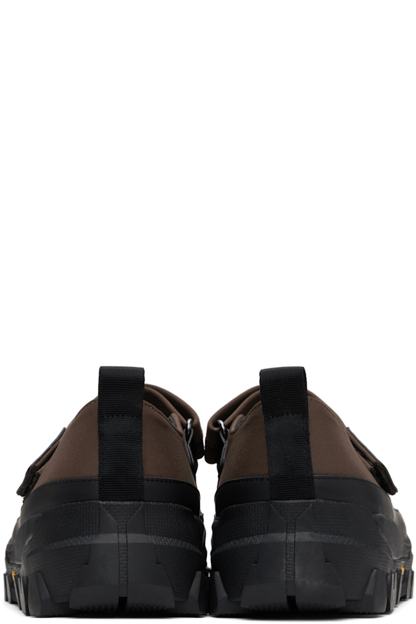 Jersey and buffed faux-leather ballerina flats in brown and black.

· Rubber cap toe
· Velcro closure
· Pull-loop at heel tab
· Padded mesh footbed
· Logo embossed at textured foam rubber midsole
· Treaded Vibram® rubber sole

Supplier color: Brown