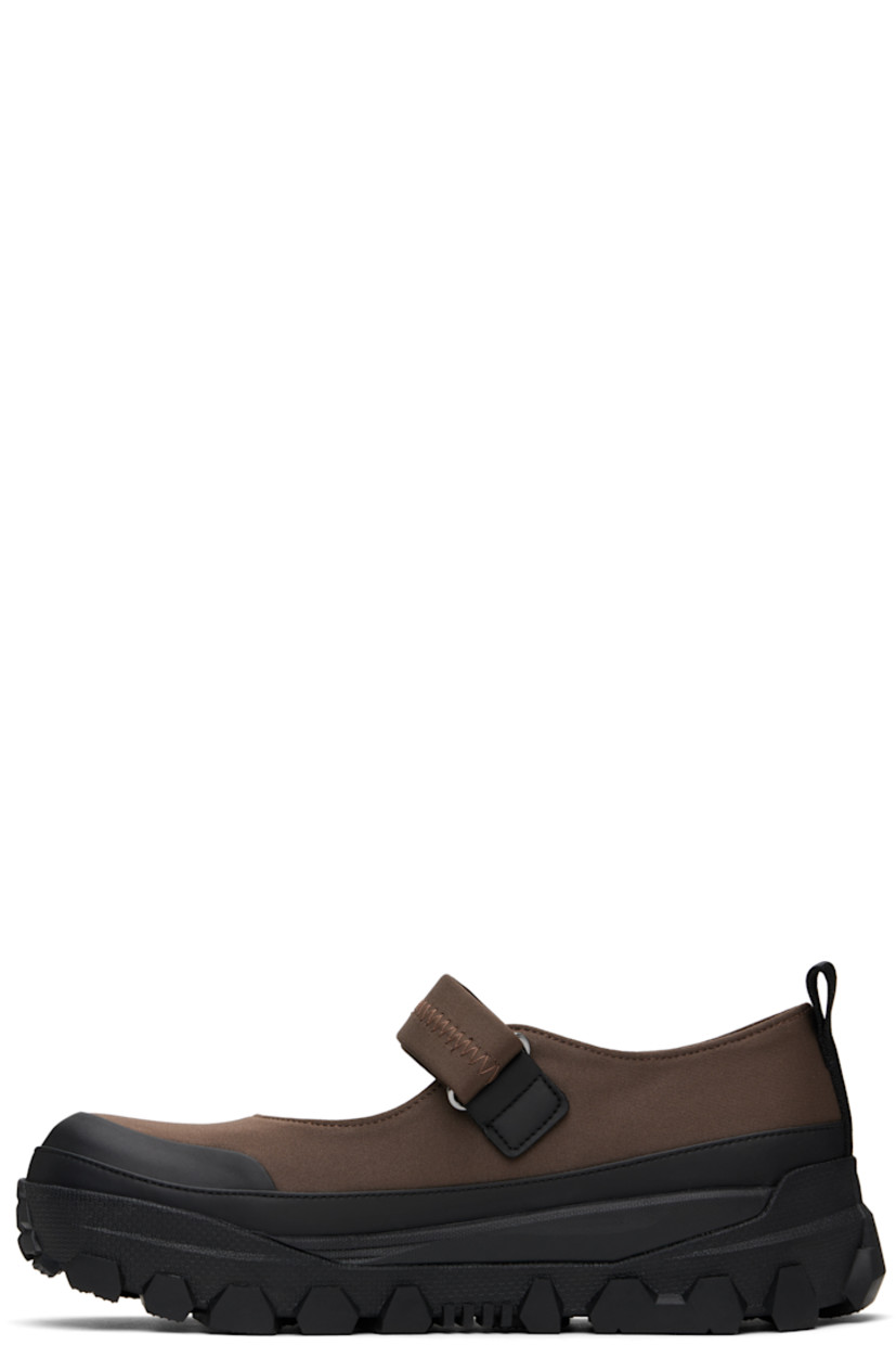 Jersey and buffed faux-leather ballerina flats in brown and black.

· Rubber cap toe
· Velcro closure
· Pull-loop at heel tab
· Padded mesh footbed
· Logo embossed at textured foam rubber midsole
· Treaded Vibram® rubber sole

Supplier color: Brown