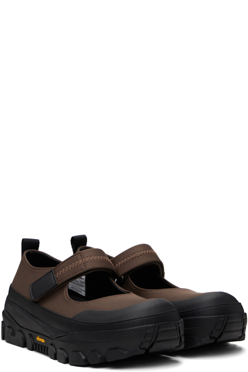 Jersey and buffed faux-leather ballerina flats in brown and black.

· Rubber cap toe
· Velcro closure
· Pull-loop at heel tab
· Padded mesh footbed
· Logo embossed at textured foam rubber midsole
· Treaded Vibram® rubber sole

Supplier color: Brown