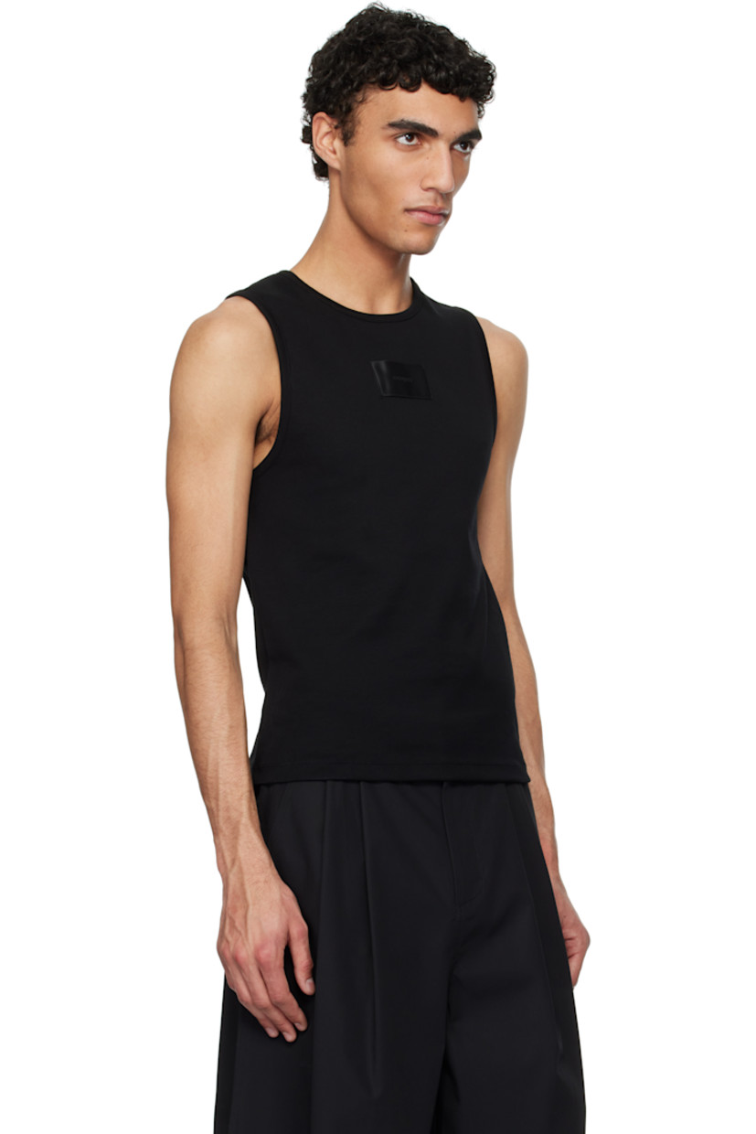 Slim-fit cotton jersey tank top.

· Rib-knit crewneck and armscyes
· Logo patch at chest

Supplier color: Black
