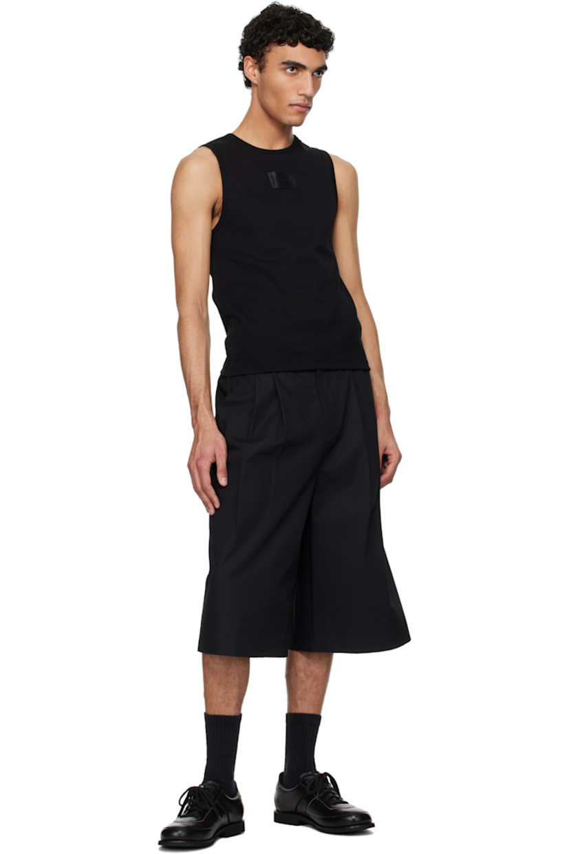 Slim-fit cotton jersey tank top.

· Rib-knit crewneck and armscyes
· Logo patch at chest

Supplier color: Black
