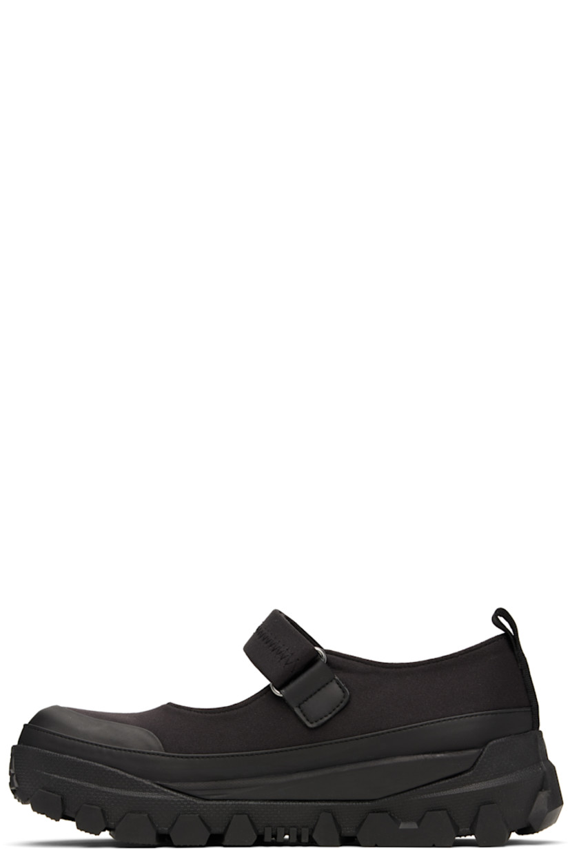Bonded jersey Mary Jane-style loafers in black.

· Rubber cap toe
· Velcro strap at vamp
· Pull-loop at heel tab
· Buffed leather lining
· Buffed faux-leather trim at welt
· Treaded Vibram® rubber sole

Supplier color: Black