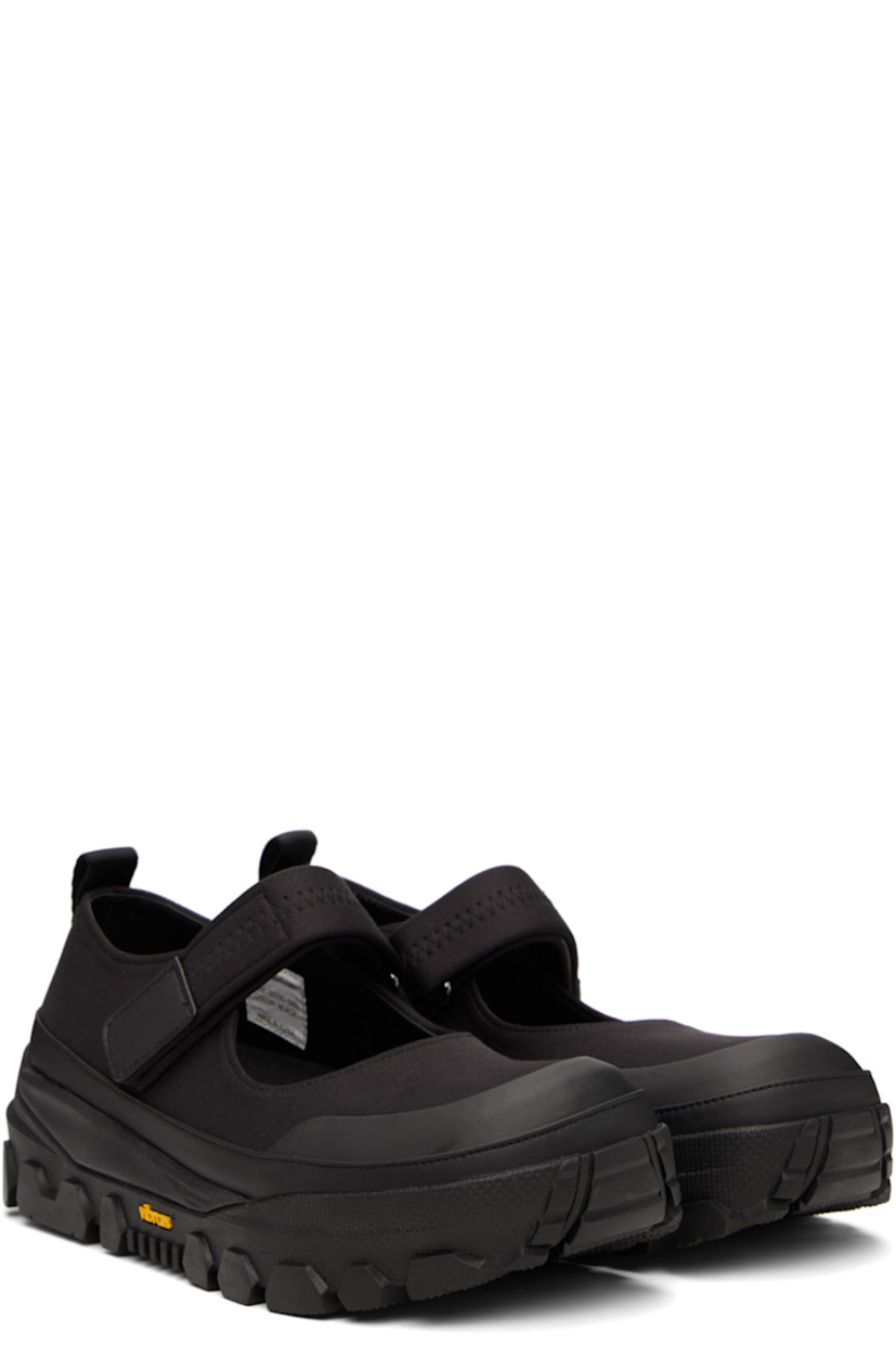 Bonded jersey Mary Jane-style loafers in black.

· Rubber cap toe
· Velcro strap at vamp
· Pull-loop at heel tab
· Buffed leather lining
· Buffed faux-leather trim at welt
· Treaded Vibram® rubber sole

Supplier color: Black