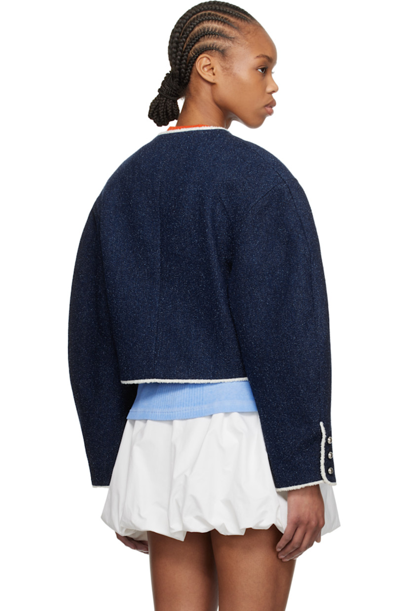 Non-stretch denim jacket. Bouclé detailing throughout.

· Round neck
· Button closure
· Patch pockets
· Cropped hem
· Dropped shoulders
· Three-button surgeon's cuffs
· Full logo-woven satin lining 
· Silver-tone hardware 

Supplier color: Blue denim