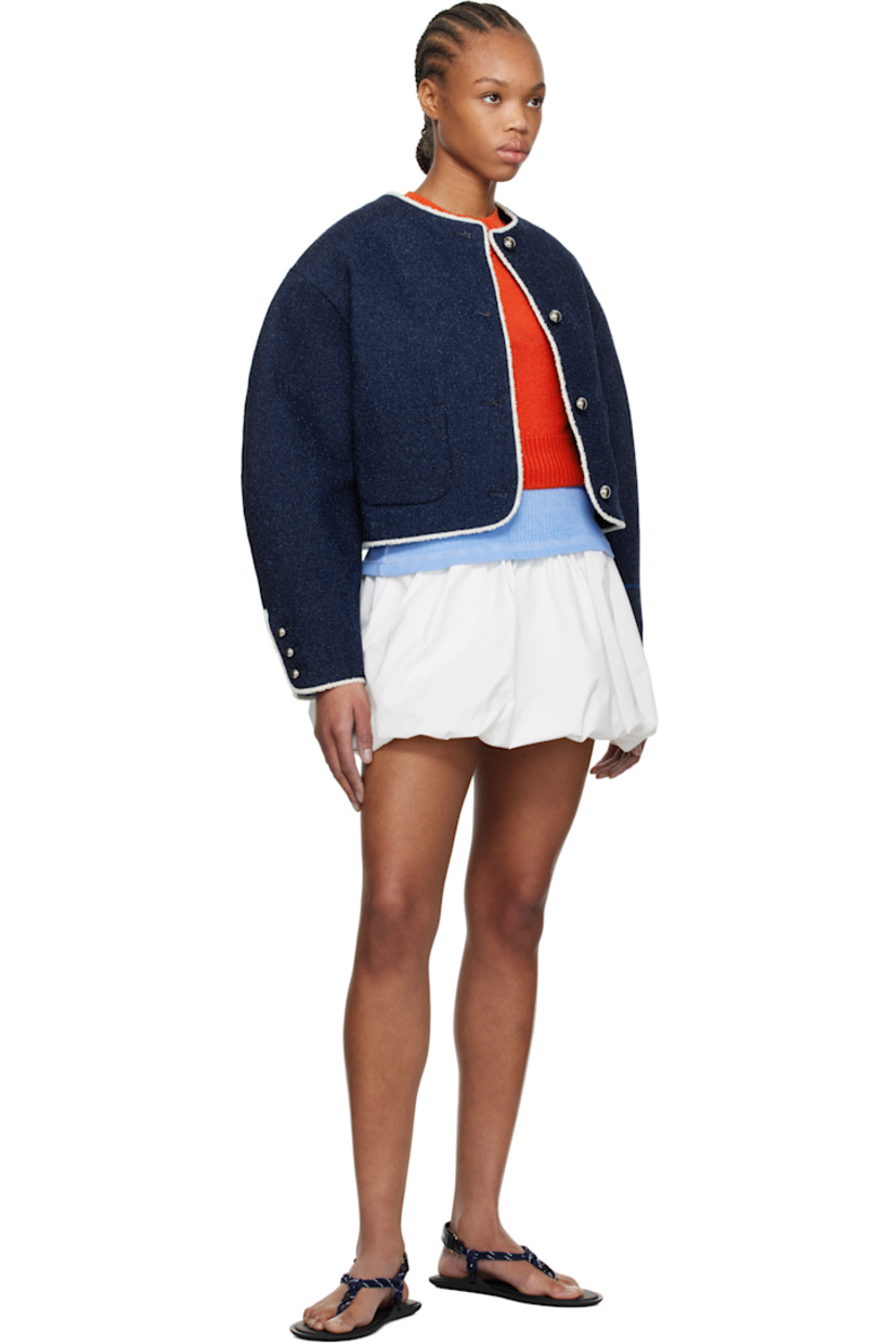 Non-stretch denim jacket. Bouclé detailing throughout.

· Round neck
· Button closure
· Patch pockets
· Cropped hem
· Dropped shoulders
· Three-button surgeon's cuffs
· Full logo-woven satin lining 
· Silver-tone hardware 

Supplier color: Blue denim