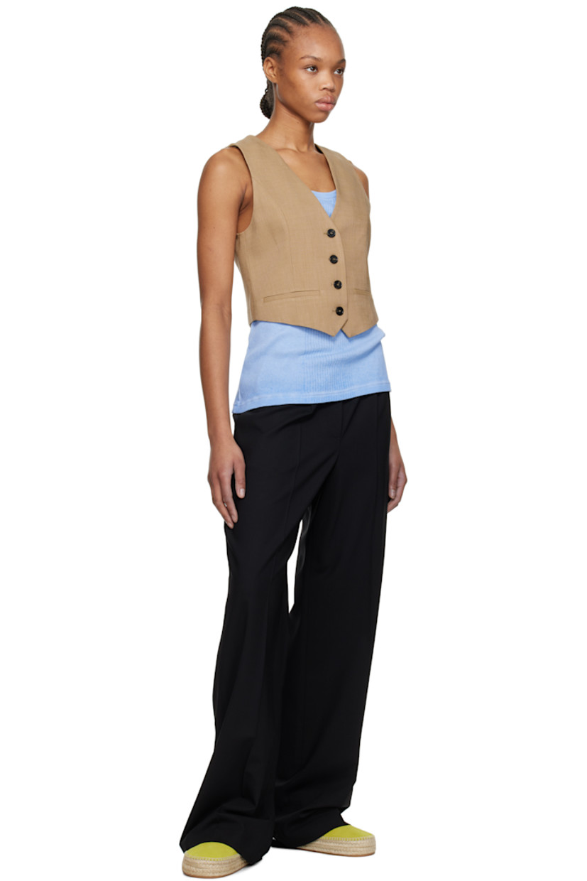Plain-woven stretch viscose-blend vest. 

· Y-neck
· Button closure
· Mock welt pockets
· Full crêpe lining

Supplier color: Beige