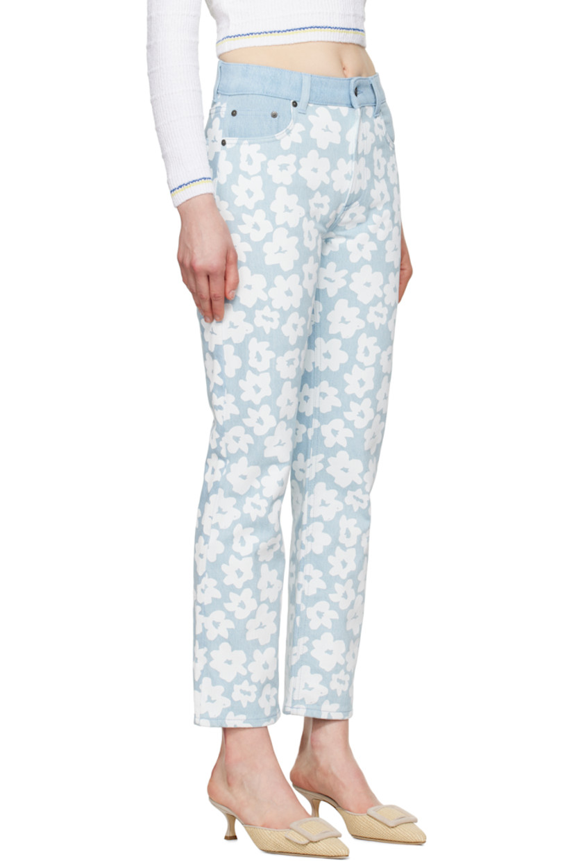 Non-stretch denim jeans. Floral pattern printed throughout. 

· Belt loops
· Five-pocket styling
· Zip fly
· Logo embroidered at front
· Leather logo patch at back waistband
· Logo-engraved gunmetal-tone hardware

Supplier color: Light blue