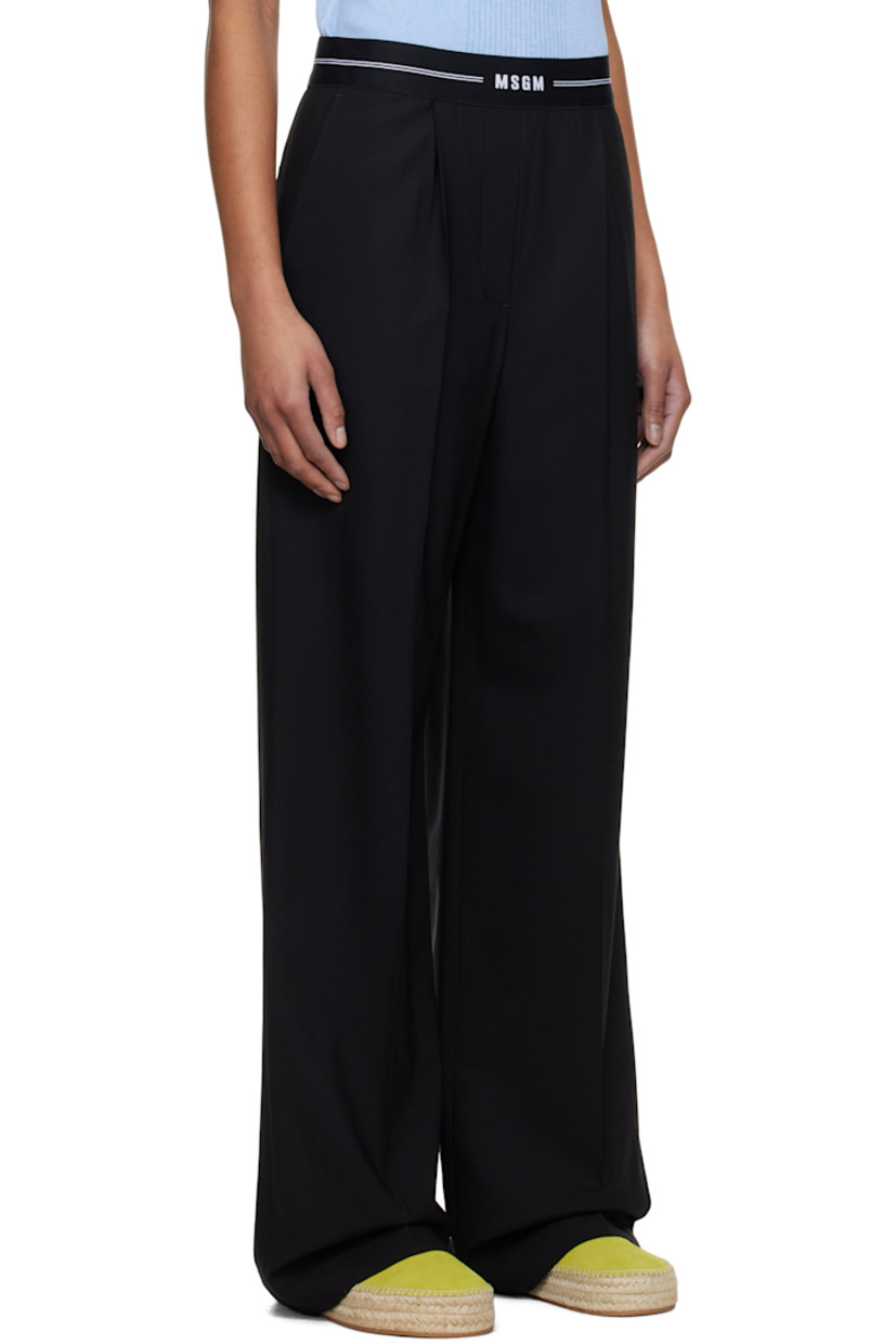 Plain-woven stretch virgin wool trousers. 

· Jacquard logo and stripes at elasticized waistband
· Three-pocket styling
· Mock fly 
· Pleats at front 
· Creased legs
· Zip closure at side seam
· Partial crêpe lining

Supplier color: Black