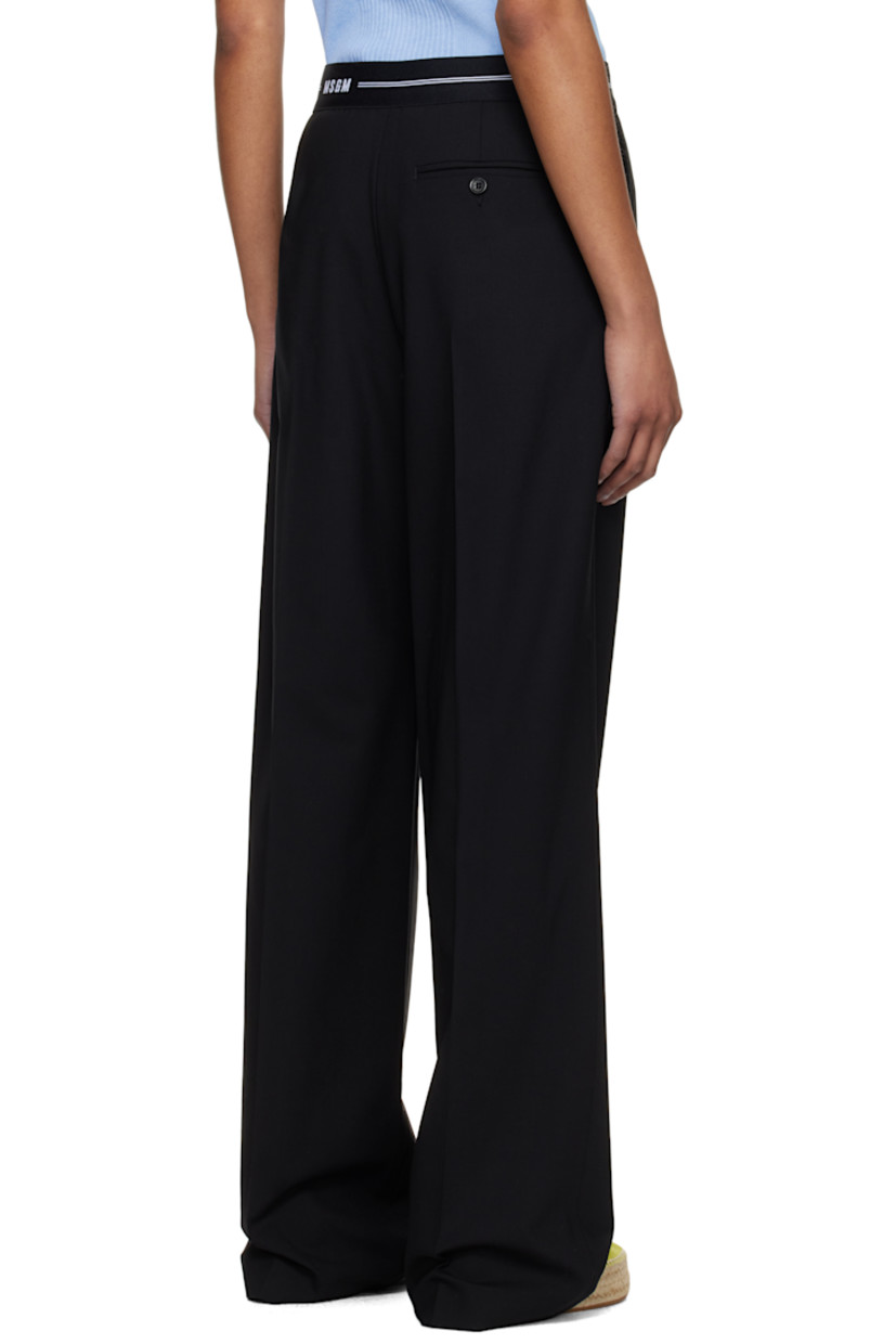 Plain-woven stretch virgin wool trousers. 

· Jacquard logo and stripes at elasticized waistband
· Three-pocket styling
· Mock fly 
· Pleats at front 
· Creased legs
· Zip closure at side seam
· Partial crêpe lining

Supplier color: Black