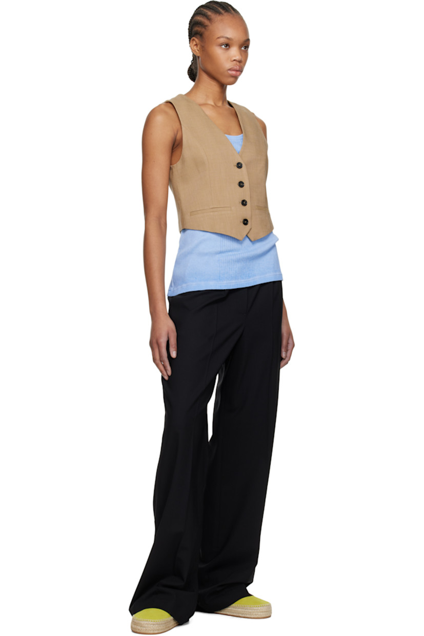 Plain-woven stretch virgin wool trousers. 

· Jacquard logo and stripes at elasticized waistband
· Three-pocket styling
· Mock fly 
· Pleats at front 
· Creased legs
· Zip closure at side seam
· Partial crêpe lining

Supplier color: Black