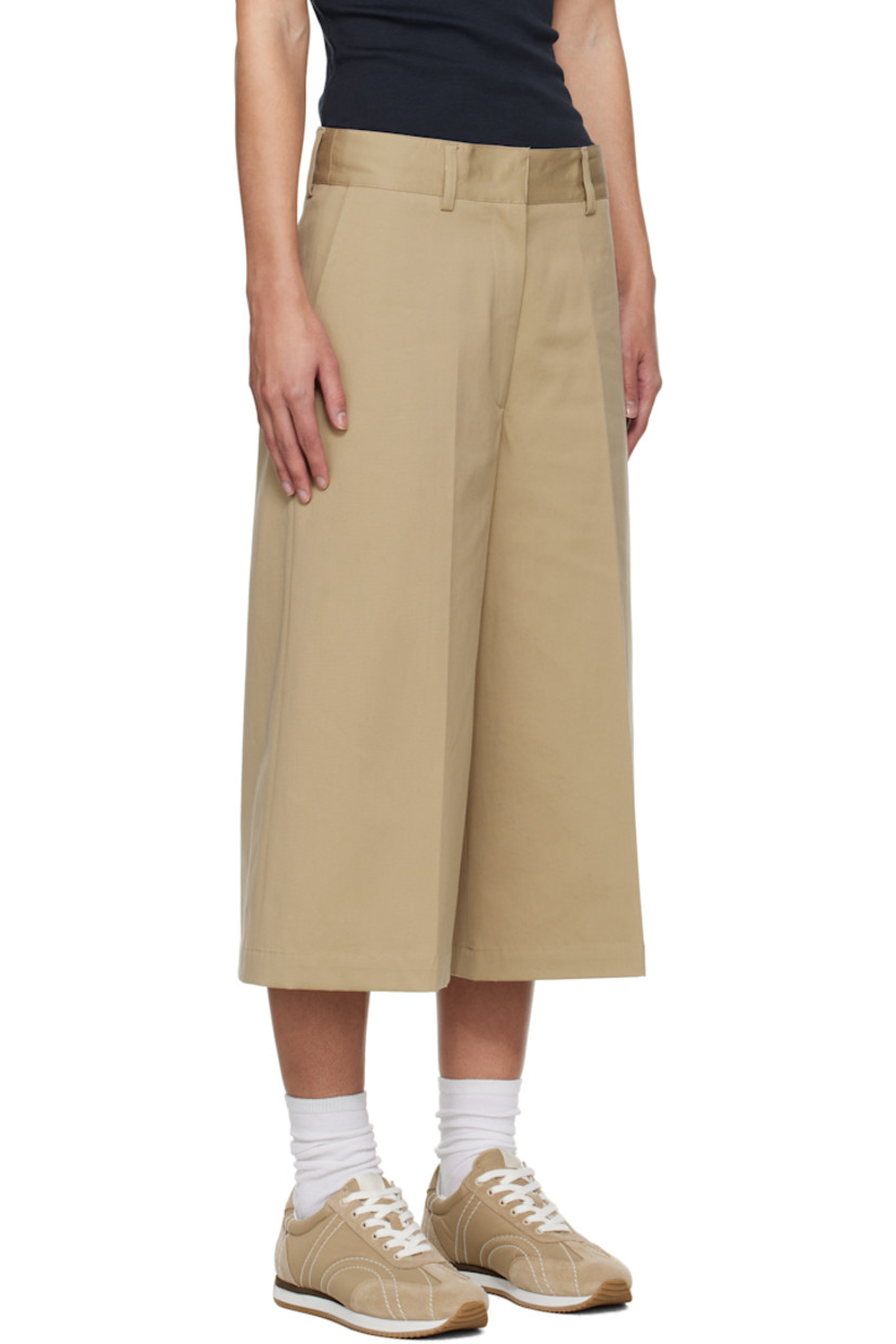 Flared stretch cotton faille shorts. 

· Belt loops
· Four-pocket styling
· Zip fly 
· Creased legs 

Supplier color: Beige