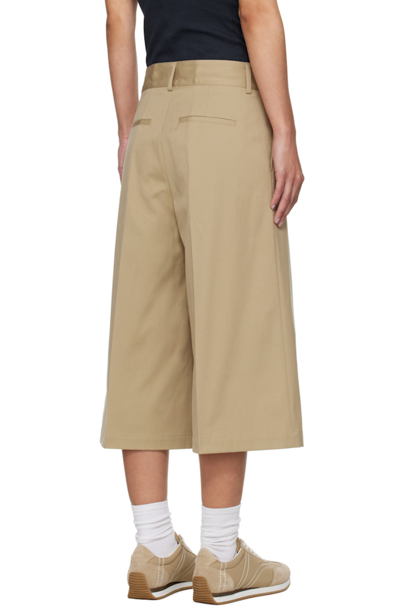 Flared stretch cotton faille shorts. 

· Belt loops
· Four-pocket styling
· Zip fly 
· Creased legs 

Supplier color: Beige