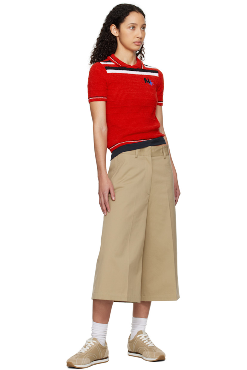 Flared stretch cotton faille shorts. 

· Belt loops
· Four-pocket styling
· Zip fly 
· Creased legs 

Supplier color: Beige