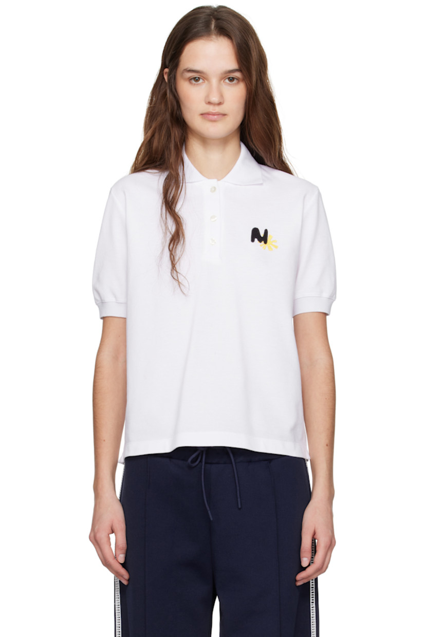 Cotton piqué polo.

· Rib-knit spread collar and cuffs
· Three-button placket
· Embroidered logo at chest
· Tennis-tail hem
· Embroidered logo at back yoke

Supplier color: White