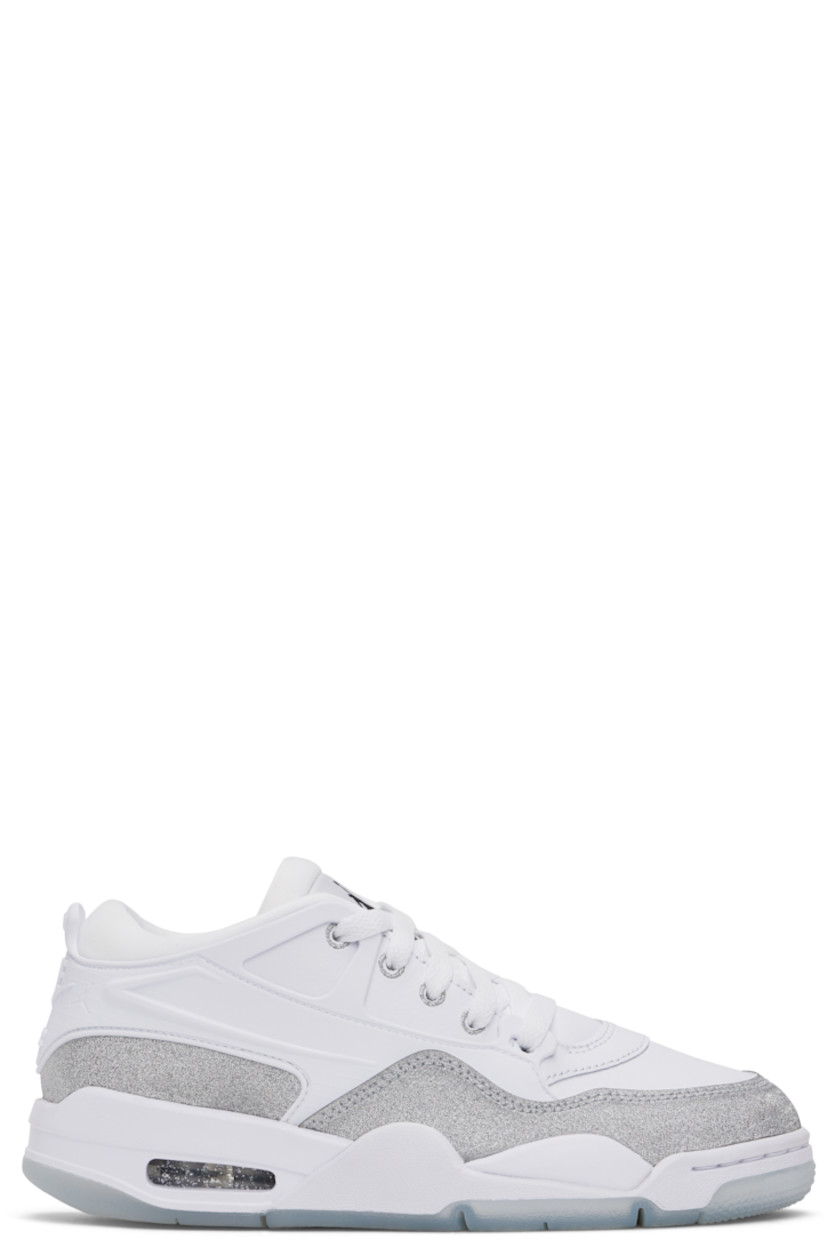Low-top grained leather and glittered leather sneakers in white and silver tone.

· Rubber overlay throughout
· Lace-up closure
· Logo patch at padded tongue
· Padded collar
· Logo embossed at heel counter
· Mesh lining
· Air Sole unit at foam rubber midsole
· Treaded rubber sole

Please note that this item may be shipped only within North America.

Supplier color: White/Metallic silver