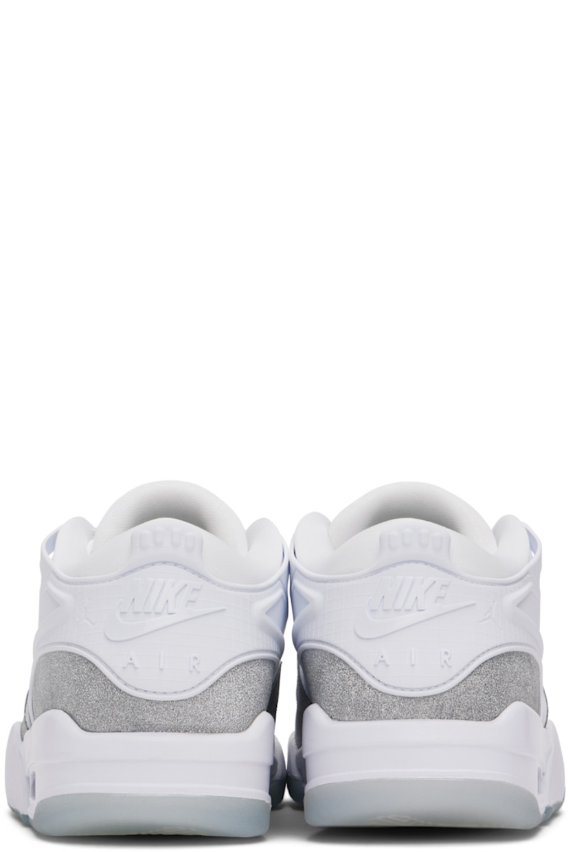 Low-top grained leather and glittered leather sneakers in white and silver tone.

· Rubber overlay throughout
· Lace-up closure
· Logo patch at padded tongue
· Padded collar
· Logo embossed at heel counter
· Mesh lining
· Air Sole unit at foam rubber midsole
· Treaded rubber sole

Please note that this item may be shipped only within North America.

Supplier color: White/Metallic silver