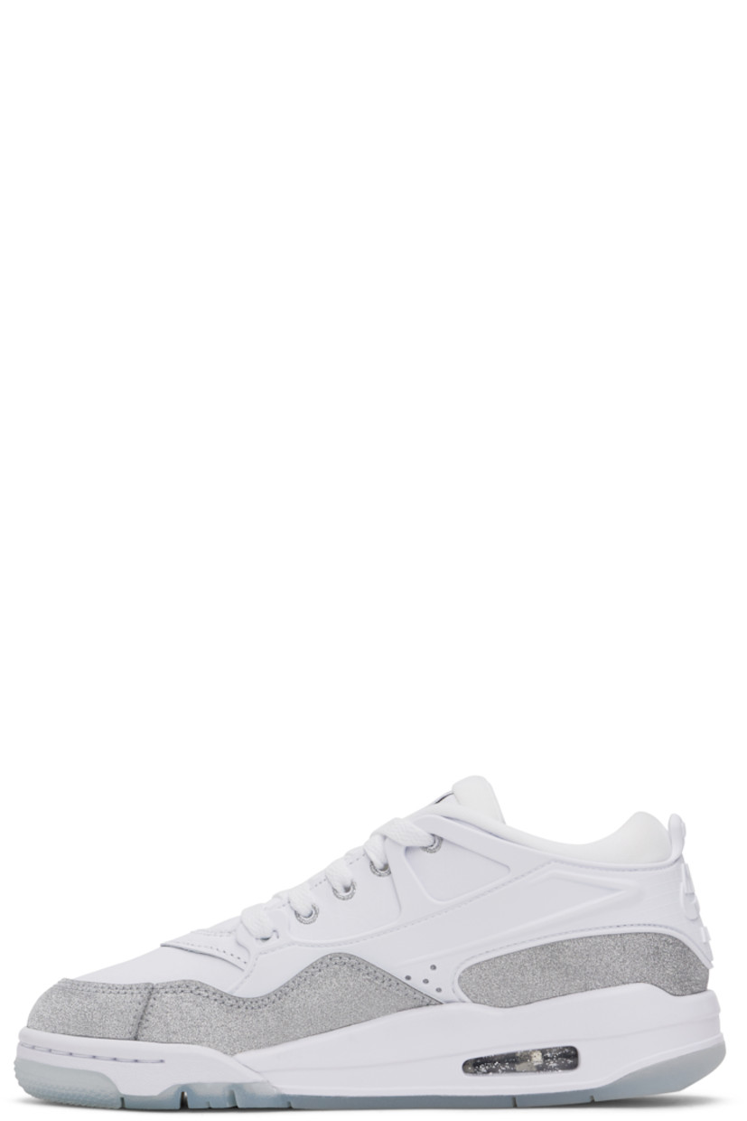 Low-top grained leather and glittered leather sneakers in white and silver tone.

· Rubber overlay throughout
· Lace-up closure
· Logo patch at padded tongue
· Padded collar
· Logo embossed at heel counter
· Mesh lining
· Air Sole unit at foam rubber midsole
· Treaded rubber sole

Please note that this item may be shipped only within North America.

Supplier color: White/Metallic silver