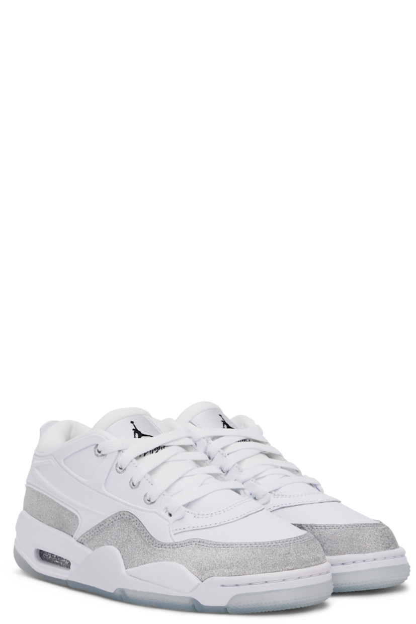 Low-top grained leather and glittered leather sneakers in white and silver tone.

· Rubber overlay throughout
· Lace-up closure
· Logo patch at padded tongue
· Padded collar
· Logo embossed at heel counter
· Mesh lining
· Air Sole unit at foam rubber midsole
· Treaded rubber sole

Please note that this item may be shipped only within North America.

Supplier color: White/Metallic silver
