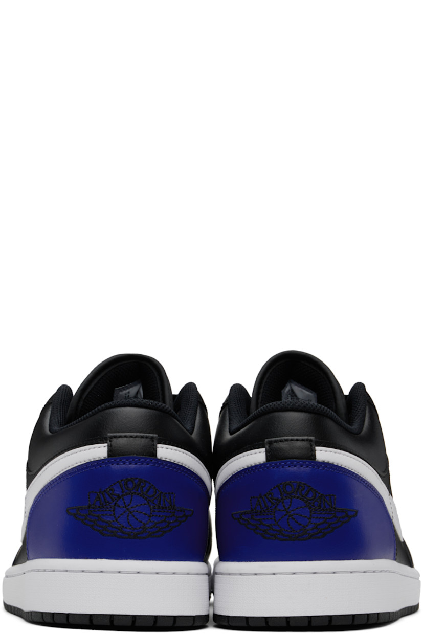 Low-top buffed leather sneakers in navy and black.

· Perforated detailing at toe
· Lace-up closure
· Logo embroidered at padded tongue
· Padded collar
· Swoosh appliqué at sides
· Logo embroidered at heel counter
· Mesh lining
· Treaded rubber sole

Please note that this item may be shipped only within North America.

Supplier color: Black/Game royal/White