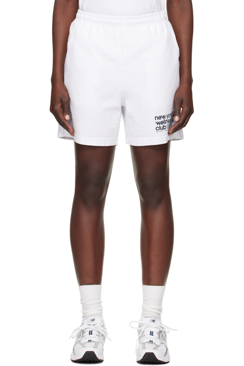 Garment-dyed 9 oz cotton jersey shorts.

· Pre-shrunk
· Concealed drawstring at elasticized waistband
· Three-pocket styling
· Logo graphic printed at front hem

Supplier color: White/Navy