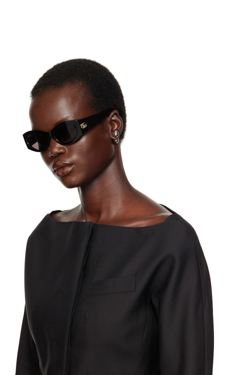 Cat-eye acetate-frame sunglasses in black.

· Gray lenses
· 100% UV protection, Category 3
· Logo etched at lens
· Integrated nose pads
· Logo hardware at hinges
· Includes velvet case
· Size: 53.19 130

Supplier color: Black