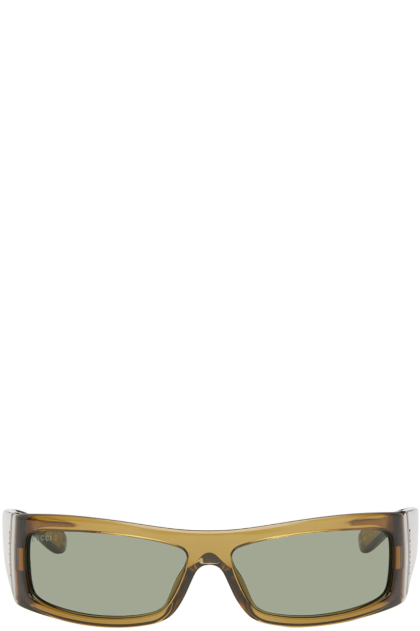 Rectangular transparent acetate-frame sunglasses in brown.

· Green lenses
· 100% UV protection, Category 2
· Logo etched at lens
· Integrated nose pads
· Logo plaque at temples
· Includes velvet case
· Size: 64.14 130

Supplier color: Brown