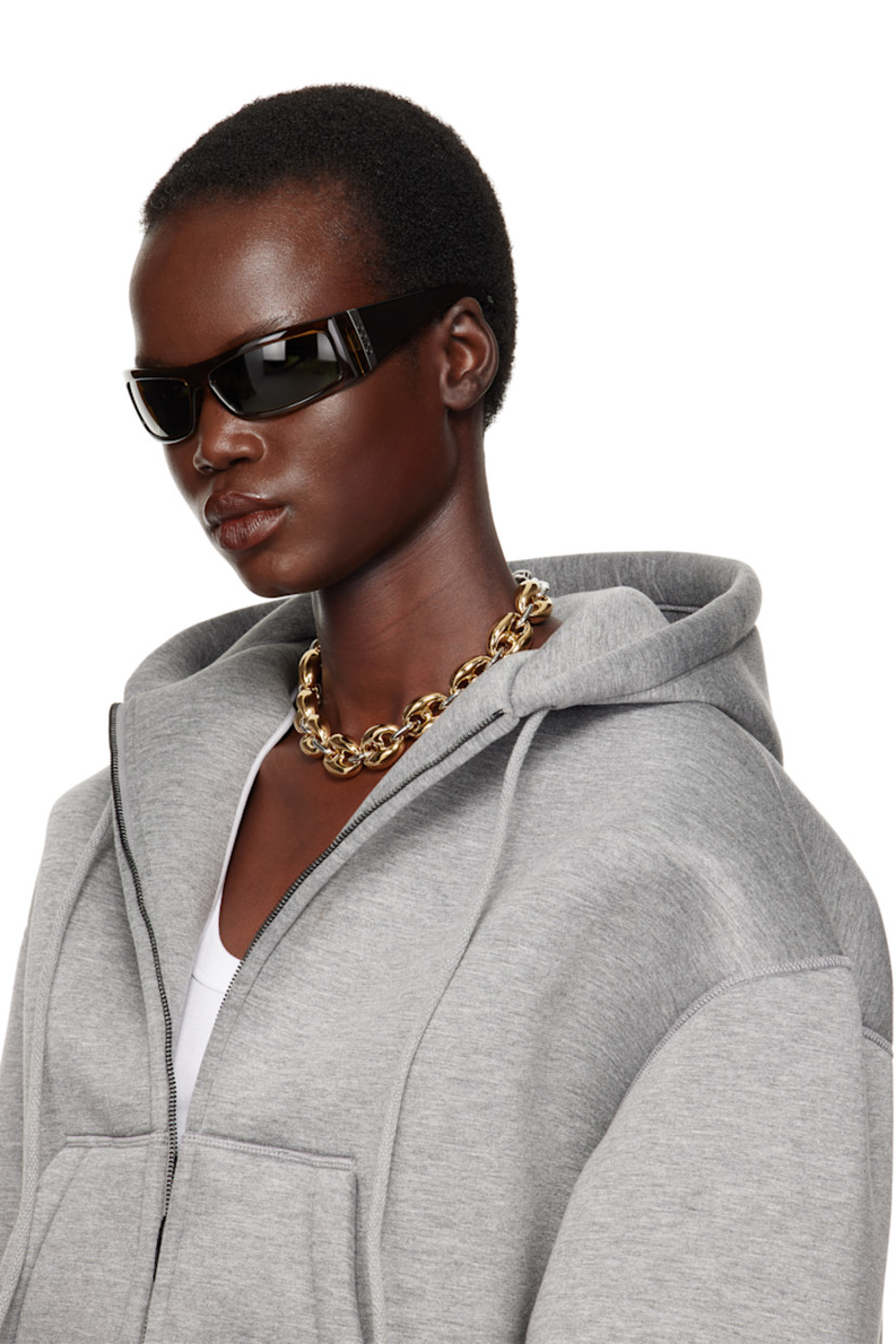 Rectangular transparent acetate-frame sunglasses in brown.

· Green lenses
· 100% UV protection, Category 2
· Logo etched at lens
· Integrated nose pads
· Logo plaque at temples
· Includes velvet case
· Size: 64.14 130

Supplier color: Brown