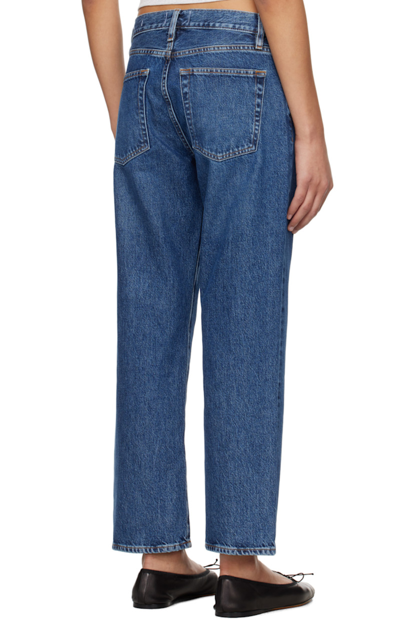Loose-fit and straight-leg non-stretch regenerative cotton denim jeans. Fading and whiskering throughout. 

· Mid-rise
· Belt loops
· Five-pocket styling
· Zip fly
· Contrast stitching in tan

Supplier color: Dark indigo