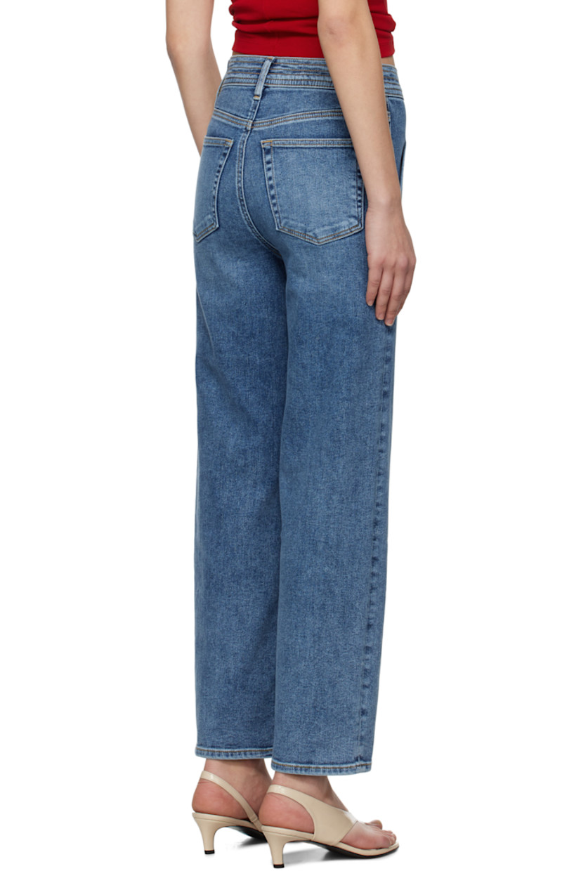 Straight-leg stretch denim jeans. Fading and subtle distressing throughout.

· High-rise
· Belt loops
· Topstitching at waistband 
· Four-pocket styling
· Zip fly
· Logo-engraved silver-tone hardware
· Contrast stitching in tan

Supplier color: Dark indigo wash