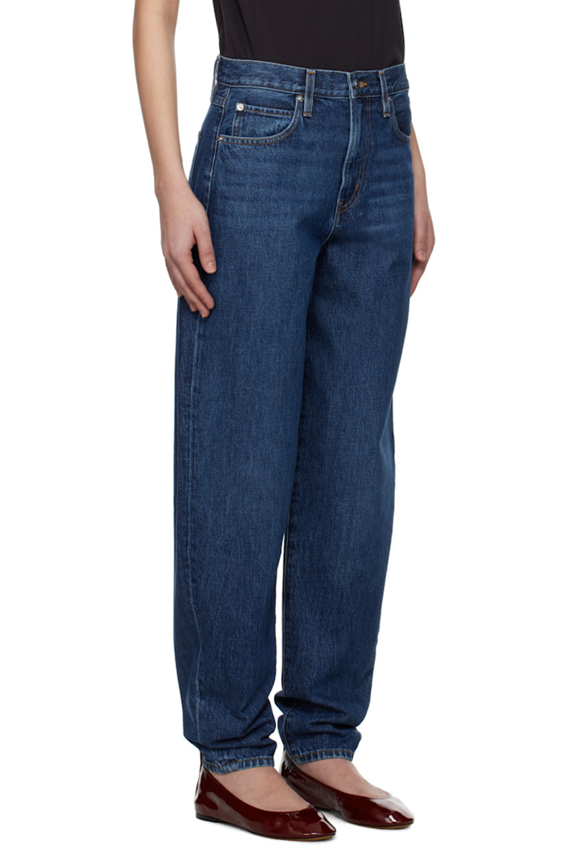 Non-stretch regenerative cotton denim jeans. Fading, whiskering, and subtle distressing throughout.

· Loose-fit and tapered
· High-rise
· Belt loops
· Five-pocket styling
· Zip fly
· Logo-engraved silver-tone hardware
· Contrast stitching in tan

Supplier color: Kirk