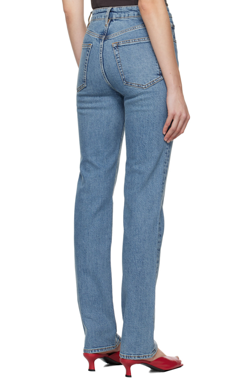 Slim-fit straight-leg stretch denim jeans. Fading and whiskering throughout. 

· High-rise 
· Belt loops
· Five-pocket styling
· Zip-fly
· Logo-engraved silver-tone hardware
· Contrast stitching in tan 

Supplier color: Indio